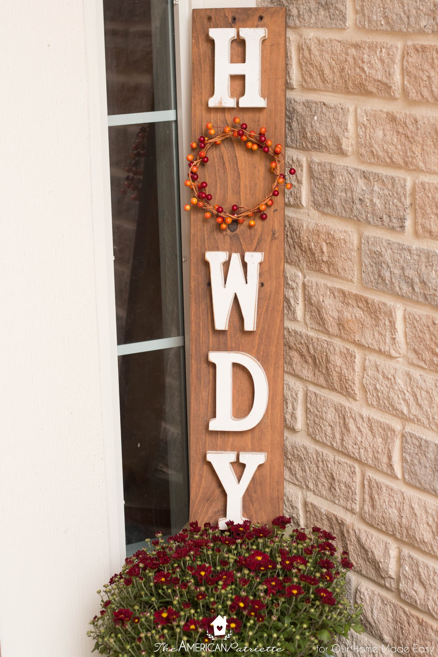 This wood Howdy sign has small pops of color