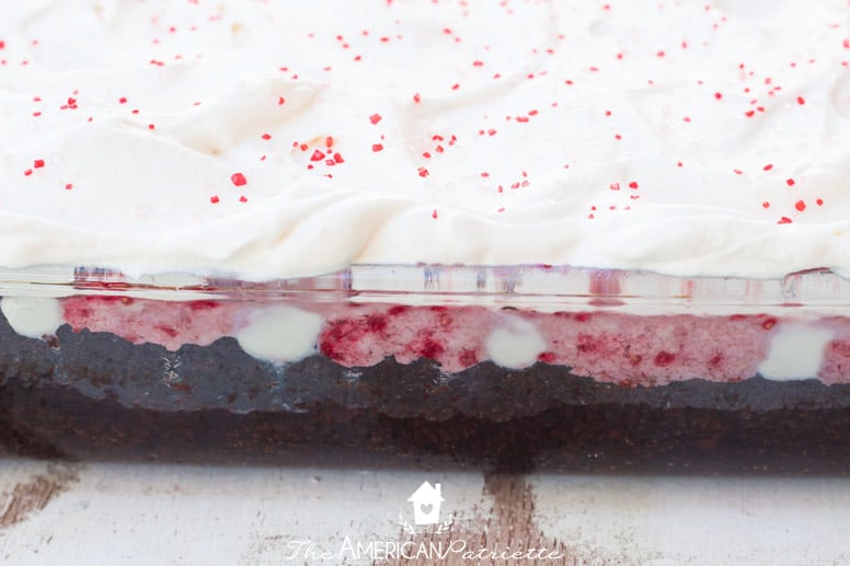 Easy White Chocolate Raspberry Truffle Poke Cake