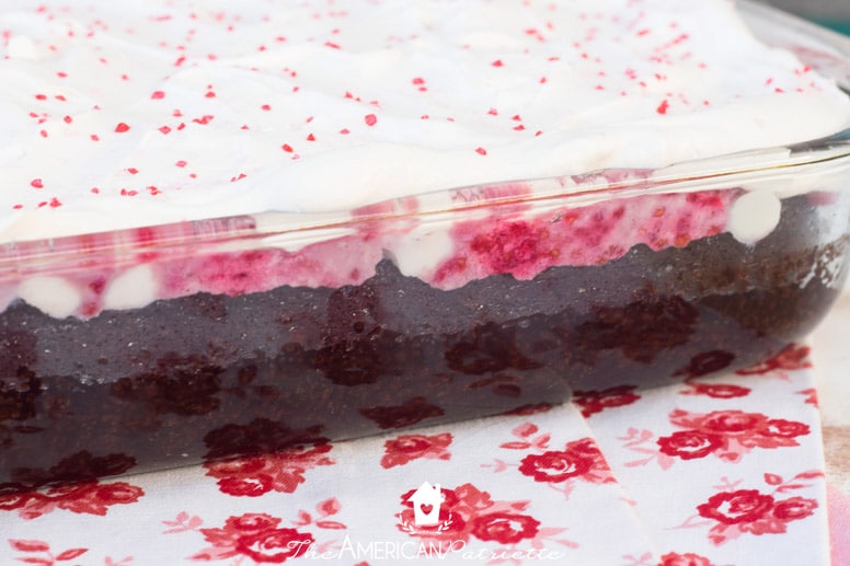 Easy White Chocolate Raspberry Truffle Poke Cake