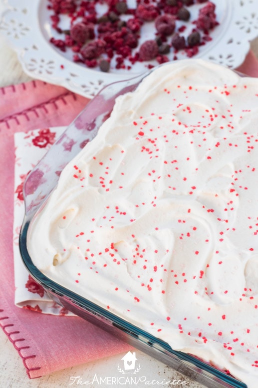 Easy White Chocolate Raspberry Truffle Poke Cake