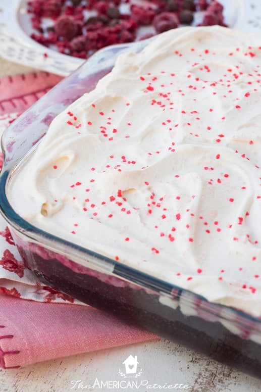 Easy White Chocolate Raspberry Truffle Poke Cake